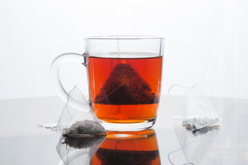 Pyramid-shaped tea bags.Homemade tea party.