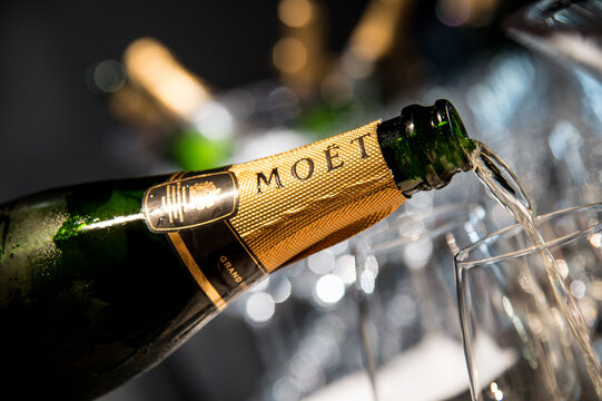 France, Paris 01-10-2021 Mo&euml;t & Chandon champagne tasting in event. Pour and serving the champagne into a glass.