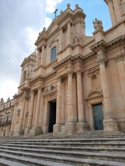 Fototapeta na wymiar The famous cathedral of Noto of Sicily made in late Baroque style, and made entirely of limestone