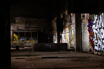 old factory from the inside graffity on the walls urban exploration lost place