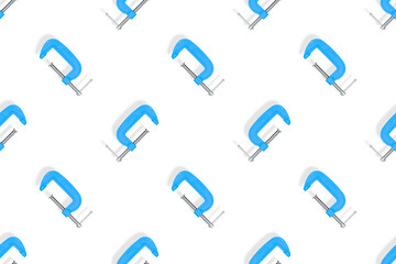 Clamp seamless pattern. Pattern of a metal clamp on a white background.