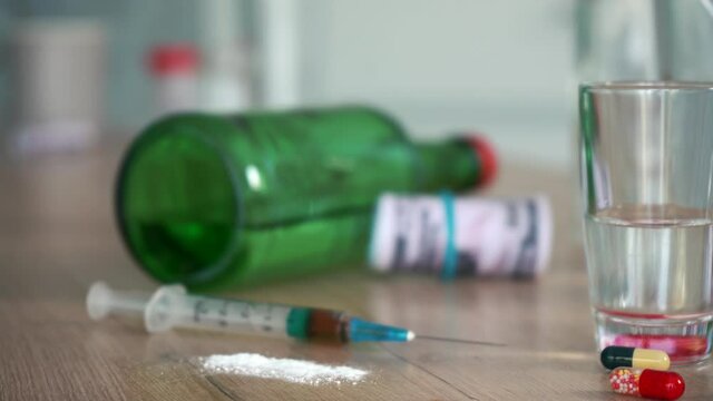 dirty table after drinking with money alcohol and drugs