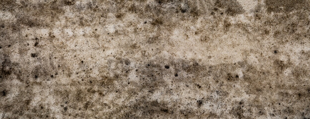 Badly stained texture on the snowy road 