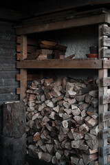 Wooden shelves filled up with wood chunks