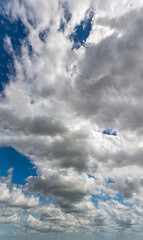 Fantastic clouds against blue sky, panorama