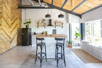 stylish kitchen interior design. white walls and wooden decoration. beautiful hammock and high windows.
