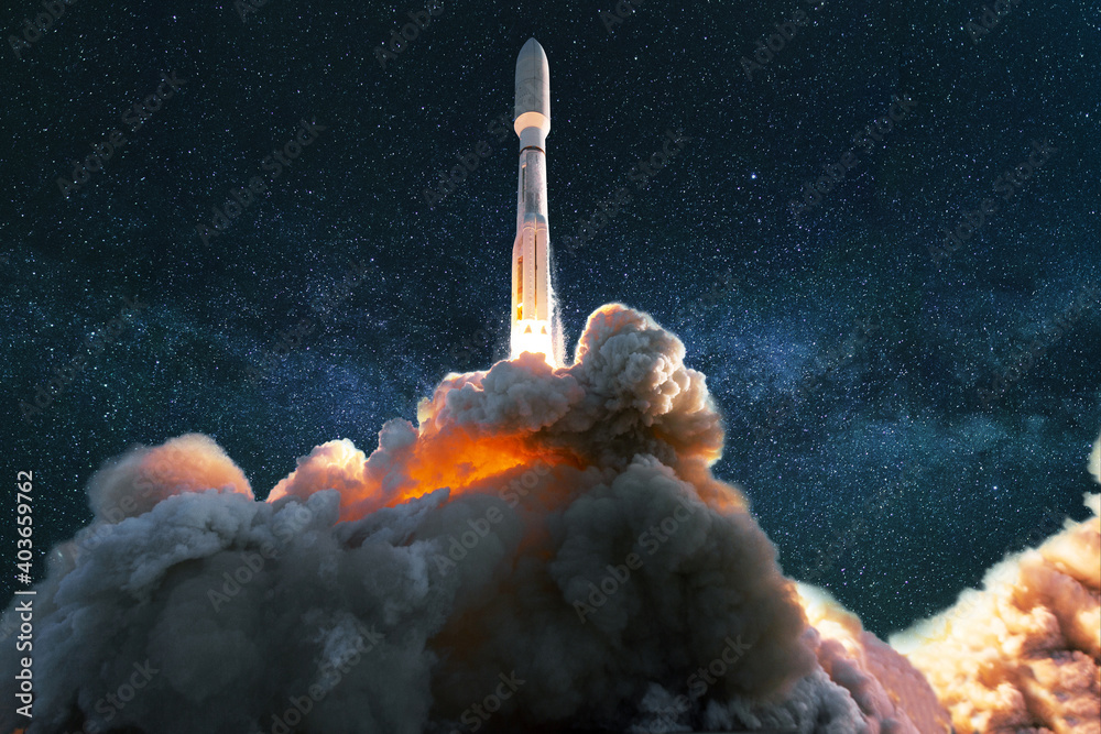 Wall mural spacecraft takes off into the starry blue sky with the milky way. successful launch of a rocket into