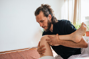 Unrecognized Woman Enjoying leg Massage