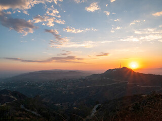 Beautiful view of the hills of Hollywood in the summer at sunset