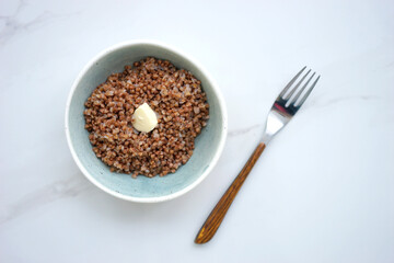 Buckwheat with butter in a small bowl