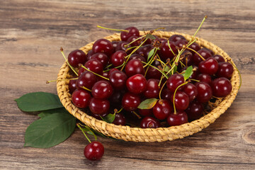 Sweet ripe cherry with leaves