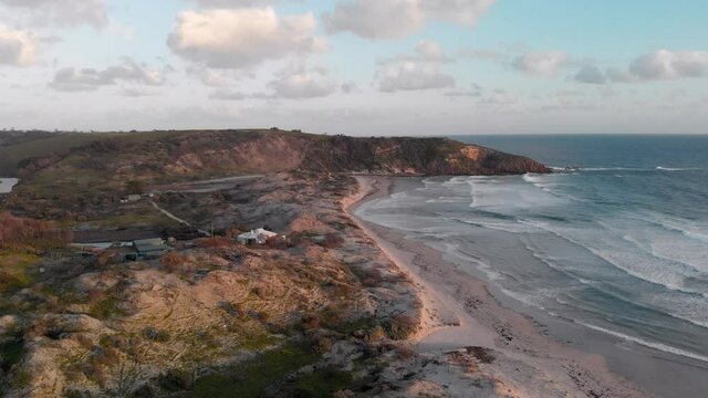 Snelling Beach on Kangaroo Island at sunset, calm blue ocean, aerial view