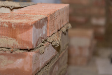Fresh Brick Wall Of Small Bricks - Close-up Masonry