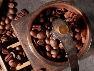 Coffee cup and coffee beans on the table