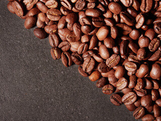 Coffee cup and coffee beans on the table