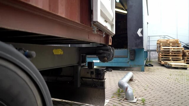 Big truck docking to loading ramp