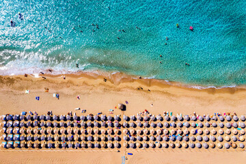 Aerial shot of beautiful turquoise beach Falasarna (Falassarna) in Crete, Greece. View of famous paradise sandy deep turquoise beach of Falasarna (Falassarna) in North West, Crete island, Greece.