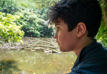 Portrait of Brazilian boy with nature background