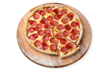 Whole Spicy Italian Pepperoni Pizza with salami slices, fresh chilli pepper and mozzarella cheese served on wooden plate served with culinary flour and spices, isolated on white background
