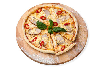 Whole spicy Pizza with sliced pork and chicken meat, mozzarella cheese, chilli pepper slices served with fresh basil on top on wooden plate served with culinary flour and spices, isolated on white
