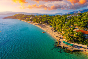 Platis Gialos beach at Argostoli of Kefalonia island in Greece. Spectacular view over beach of Platis Gialos near Lassi, Argostoli. Platis Gialos beach with soft sand and turquoise water in Lassi.