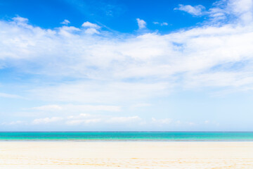 Fototapeta na wymiar empty beach and blue sky, background