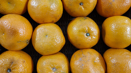Fresh citrus fruit with orange color in a traditional market, Indonesia