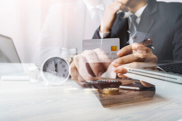 businesswoman holding coins putting in glass with using smartphone and calculator to calculate concept saving money for finance accounting