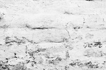 Texture of a brick wall with cracks and scratches which can be used as a background