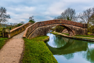 The Rainbow Bridge at Foxton Locks, UK reflected in the Grand Union Canal on a still winter's afternoon