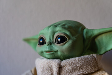 Naklejka premium DECEMBER 2020: The Child, Grogu or baby Yoda, fictional character from the TV series The Mandalorian.