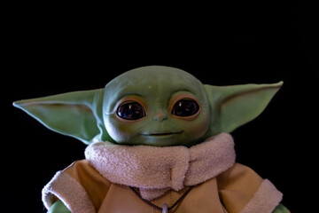 Naklejka premium DECEMBER 2020: The Child, Grogu or baby Yoda, fictional character from the TV series The Mandalorian.