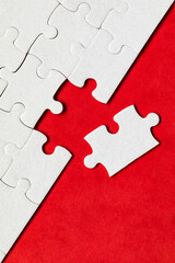 White jigsaw puzzle pieces. Fill in pieces of the jigsaw puzzle. Complete the jigsaw puzzle with...