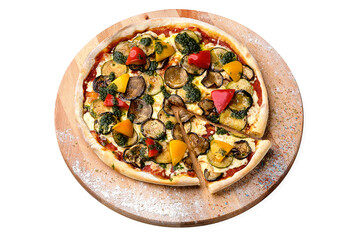 Whole vegetarian Pizza with paprika, zucchini, eggplant, mozzarella cheese  served with basil pesto sauce on wooden plate served with culinary flour and spices, isolated on white background
