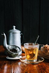 Transparent cup of green tea