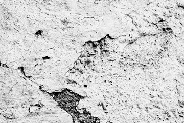 Texture of a concrete wall with cracks and scratches which can be used as a background
