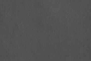 Cardboard black abstract texture close-up. Dark old paper background. Grunge concrete wall. Vintage...