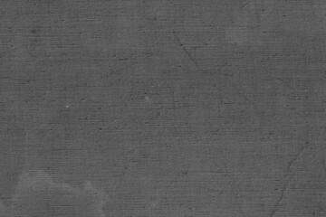 Cardboard black abstract texture close-up. Dark old paper background. Grunge concrete wall. Vintage blank wallpaper.