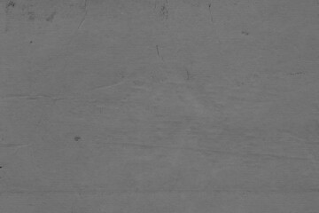 Cardboard black abstract texture close-up. Dark old paper background. Grunge concrete wall. Vintage blank wallpaper.