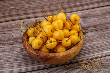 Sweet ripe yellow cherry heap