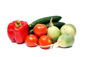 Fresh vegetables and fruits on white background