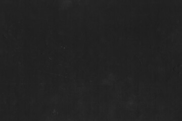 Cardboard black abstract texture close-up. Dark old paper background. Grunge concrete wall. Vintage blank wallpaper.