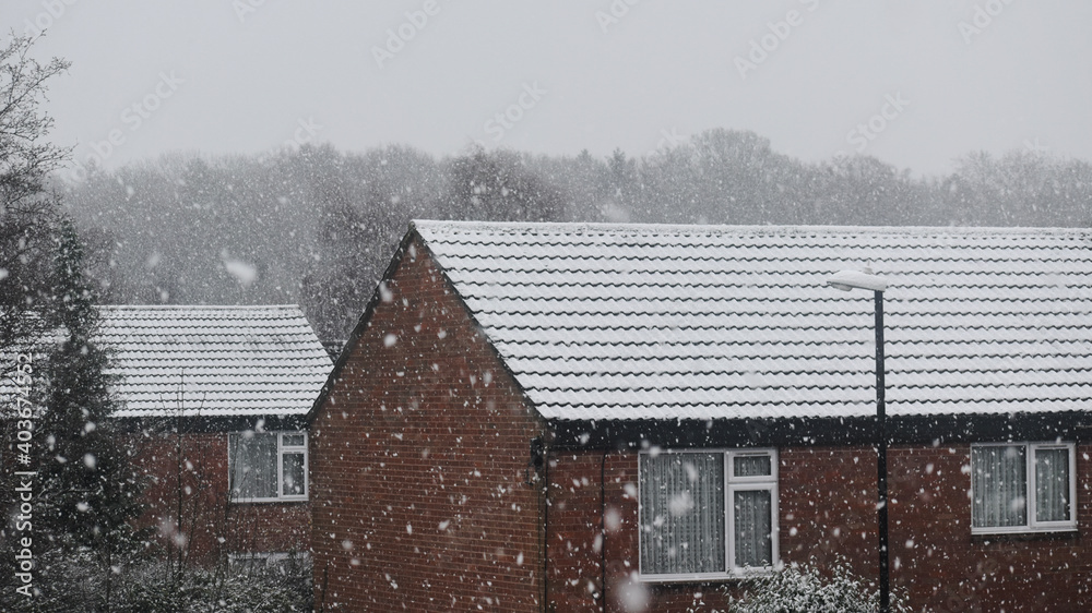 Wall mural old brick houses in snow on a winter morning, coventry, uk