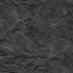 Cardboard black abstract texture close-up. Dark old paper background. Grunge concrete wall. Vintage blank wallpaper.