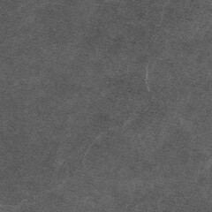 Cardboard black abstract texture close-up. Dark old paper background. Grunge concrete wall. Vintage blank wallpaper.