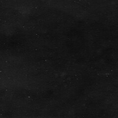 Cardboard black abstract texture close-up. Dark old paper background. Grunge concrete wall. Vintage blank wallpaper.