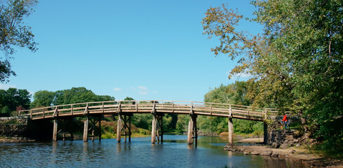 Fototapeta na wymiar Historical wooden bridge in minute man national historical park MA USA