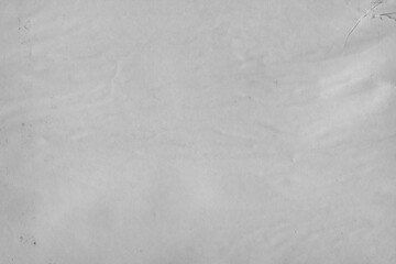 Cardboard black abstract texture close-up. Dark old paper background. Grunge concrete wall. Vintage blank wallpaper.
