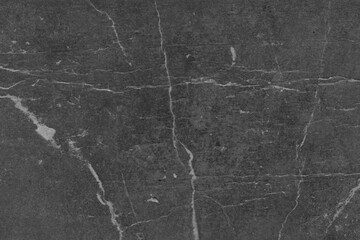 Cardboard black abstract texture close-up. Dark old paper background. Grunge concrete wall. Vintage blank wallpaper.