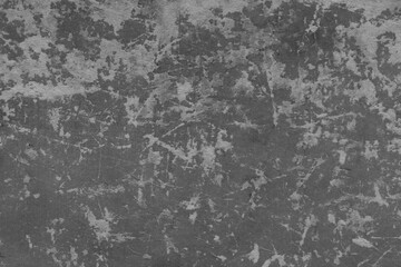 Cardboard black abstract texture close-up. Dark old paper background. Grunge concrete wall. Vintage blank wallpaper.
